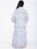 Abaya ample à broderies dorées et pompon