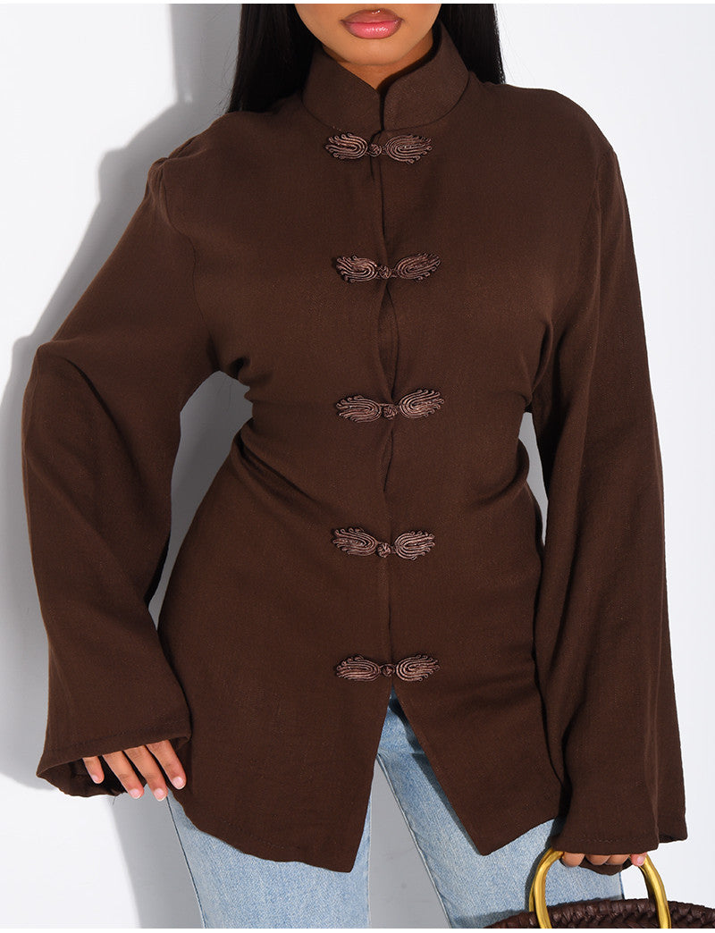 Blouse col montant à attaches qui se noue dans le dos
