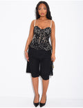 Bustier en dentelle et bretelles en perles