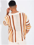Chemise ajourée manches courtes à motifs