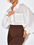 Chemise en voile transparent à nouer aux manches