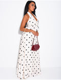 Ensemble à pois jupe longue et crop top dos nu