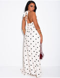 Ensemble à pois jupe longue et crop top dos nu
