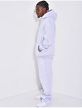 Ensemble de jogging uni pantalon et veste à capuche