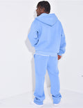 Ensemble molletonné pantalon et veste à capuche