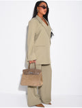 Ensemble premium blazer oversize à fentes et pantalon de tailleur droit
