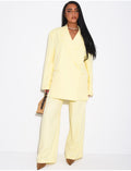 Ensemble premium blazer oversize à fentes et pantalon de tailleur droit