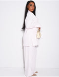 Ensemble premium blazer oversize à fentes et pantalon de tailleur droit