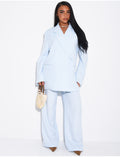 Ensemble premium blazer oversize à fentes et pantalon de tailleur droit