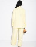 Ensemble premium blazer oversize à fentes et pantalon de tailleur droit