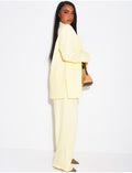 Ensemble premium blazer oversize à fentes et pantalon de tailleur droit