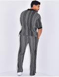 Ensemble pantalon et polo à motifs