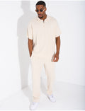 Ensemble pantalon et polo zippé