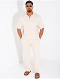Ensemble pantalon et polo zippé