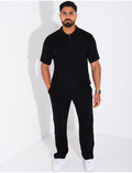 Ensemble pantalon et polo zippé