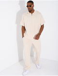Ensemble pantalon et polo zippé