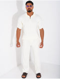 Ensemble pantalon et polo zippé