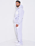 Ensemble pantalon et sweat zippé à motifs