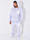 Ensemble pantalon et sweat zippé à motifs