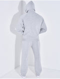 Ensemble pantalon et veste à capuche avec col