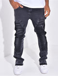 Jeans à empiècements contrastants et tâches de peinture