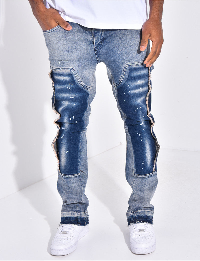 Jeans à empiècements contrastants et tâches de peinture
