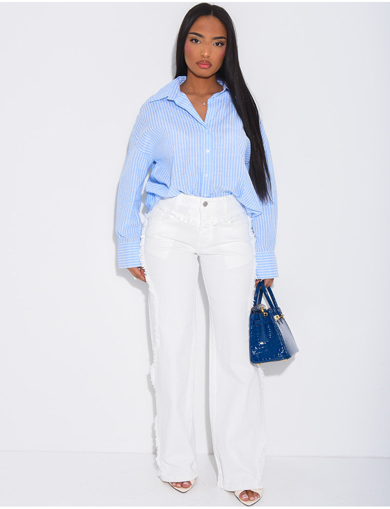 Jeans coupe large taille moyenne à coutures effilochées