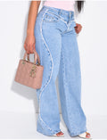 Jeans coupe large taille moyenne à coutures effilochées