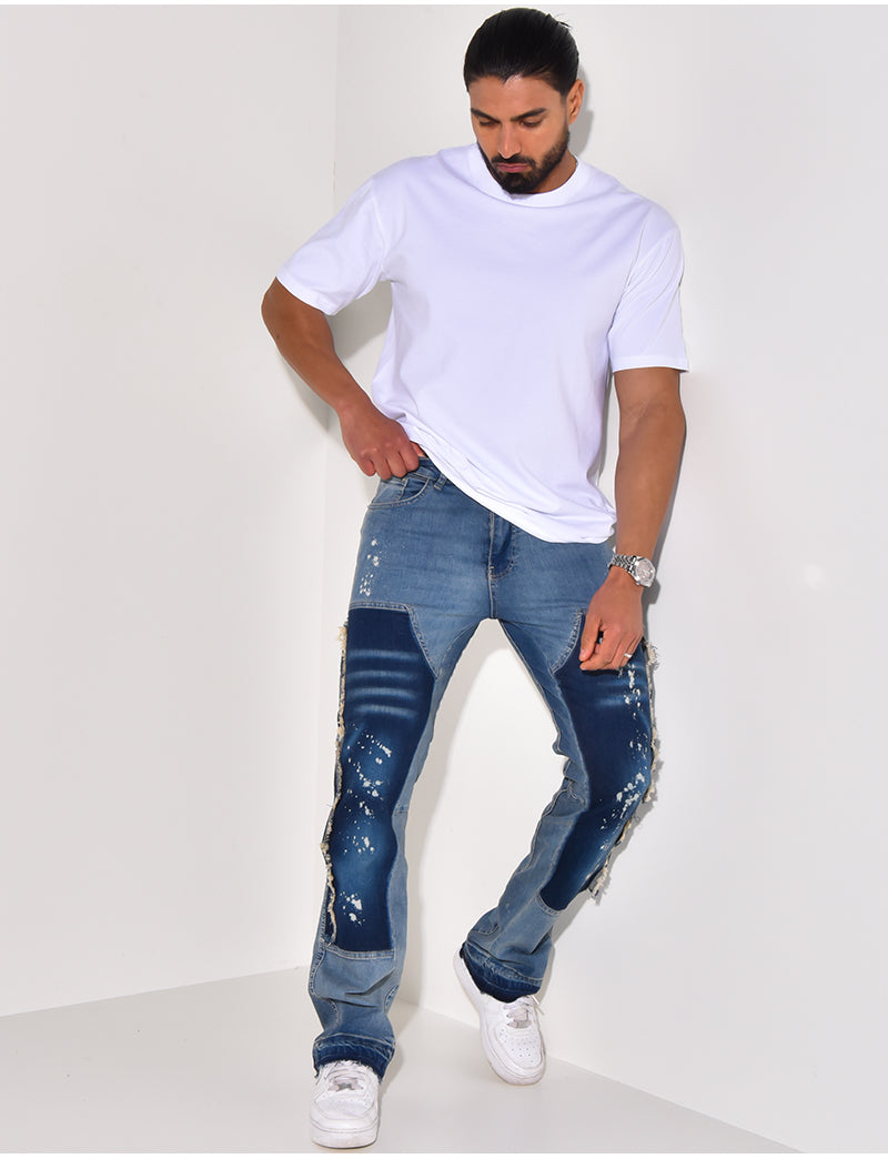 Jeans à empiècements et tâches de peinture