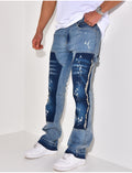 Jeans à empiècements et tâches de peinture