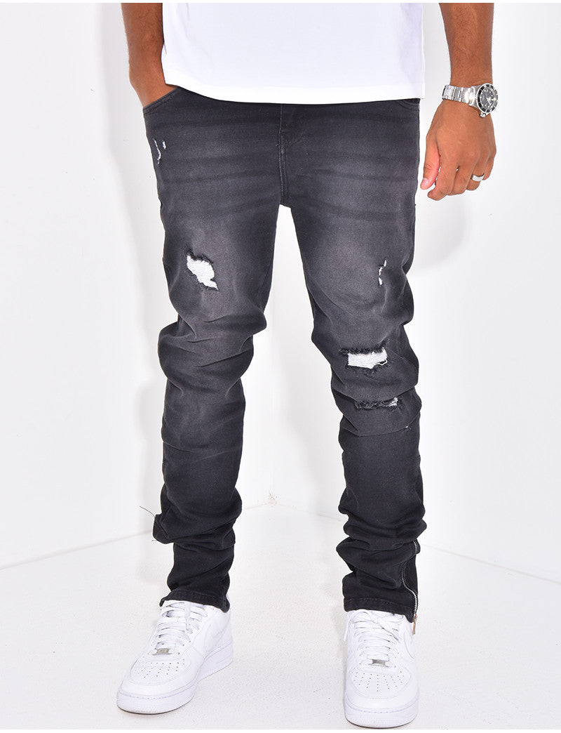 Jeans à fermeture éclaire et tâches