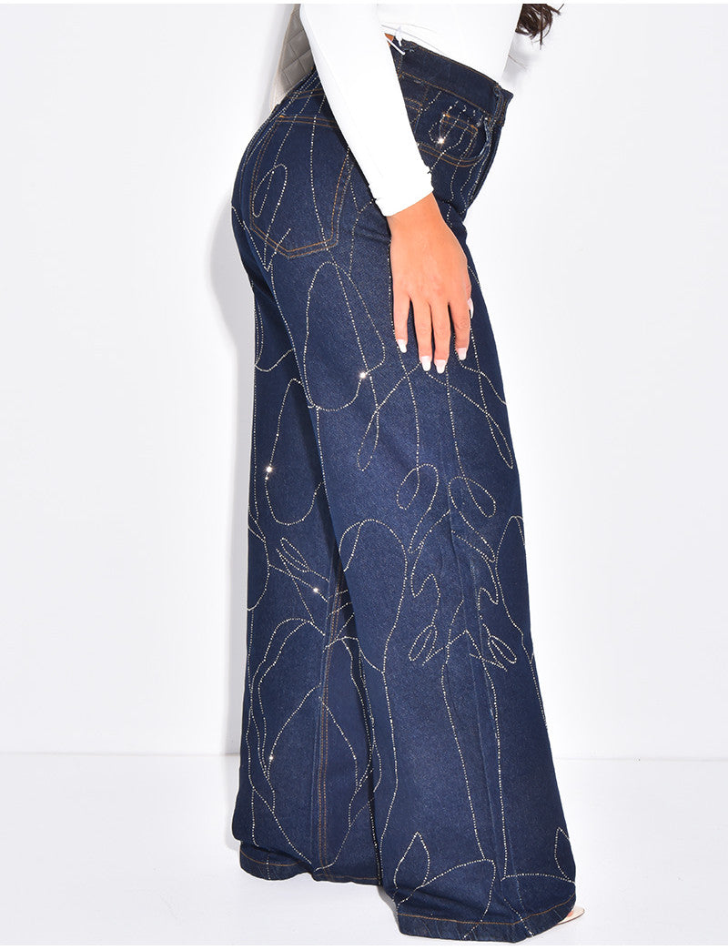 Jeans coupe large bleu brut à strass