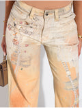 Jeans coupe droite à motifs imprimés dans les tons camel