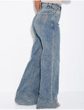 Jeans coupe large stretchy avec revers