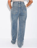 Jeans coupe large stretchy avec revers