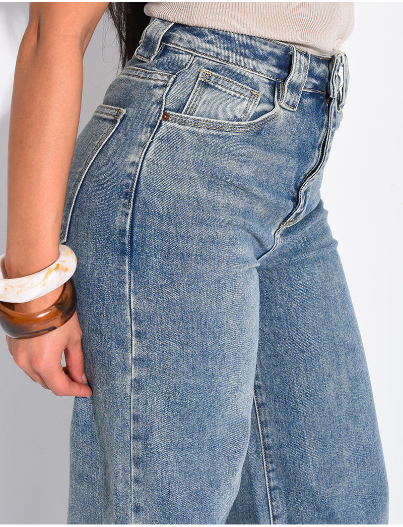 Jeans coupe large stretchy avec revers