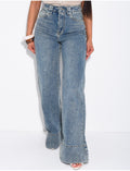 Jeans coupe large stretchy avec revers