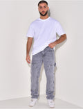 Jeans avec empiècements à motifs en relief