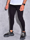 Jeans basic effiloché aux chevilles