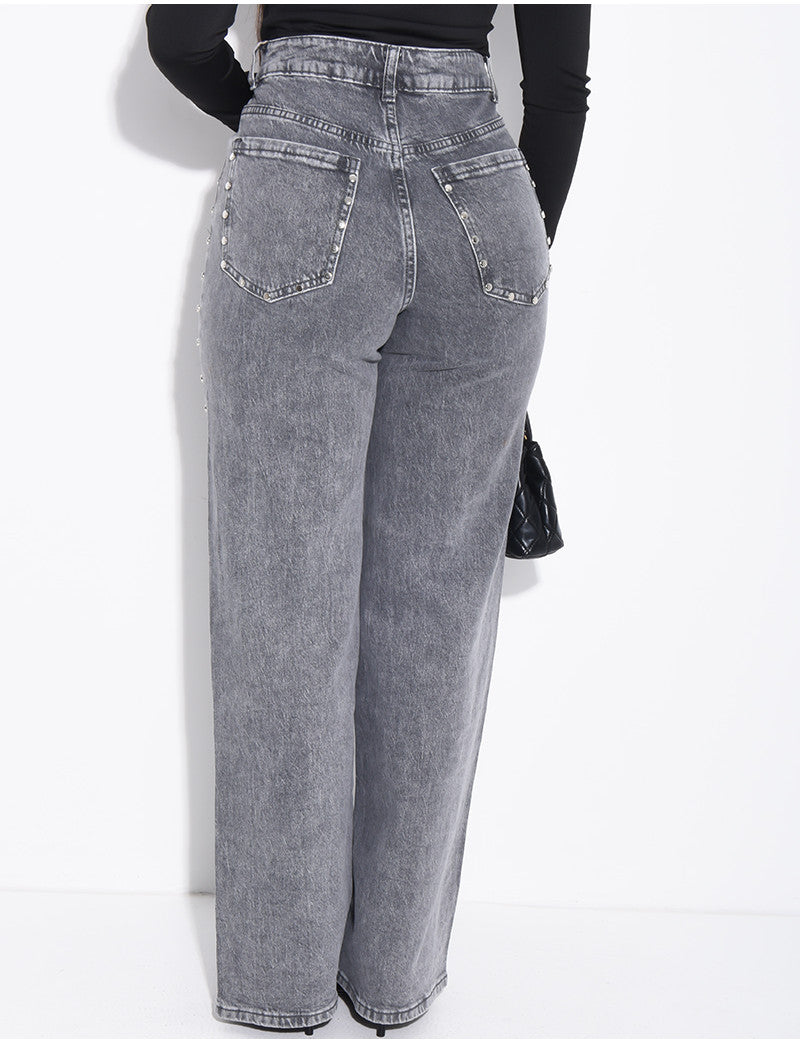 Jeans coupe droite délavé à clous sur les bordures