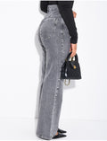 Jeans coupe droite délavé à clous sur les bordures