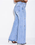 Jeans coupe droite taille haute à oeillets