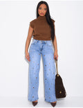 Jeans coupe droite taille haute à oeillets