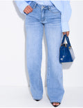 Jeans coupe droite à oeillets