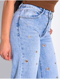Jeans coupe droite taille haute à oeillets