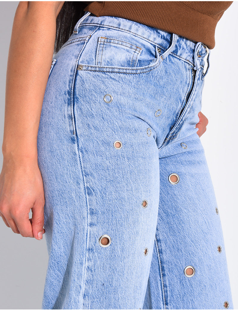 Jeans coupe droite taille haute à oeillets