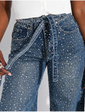 Jeans wide leg à strass de partout et ceinture assortie