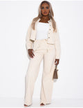 Jeans coupe droite beige à élastique à la taille