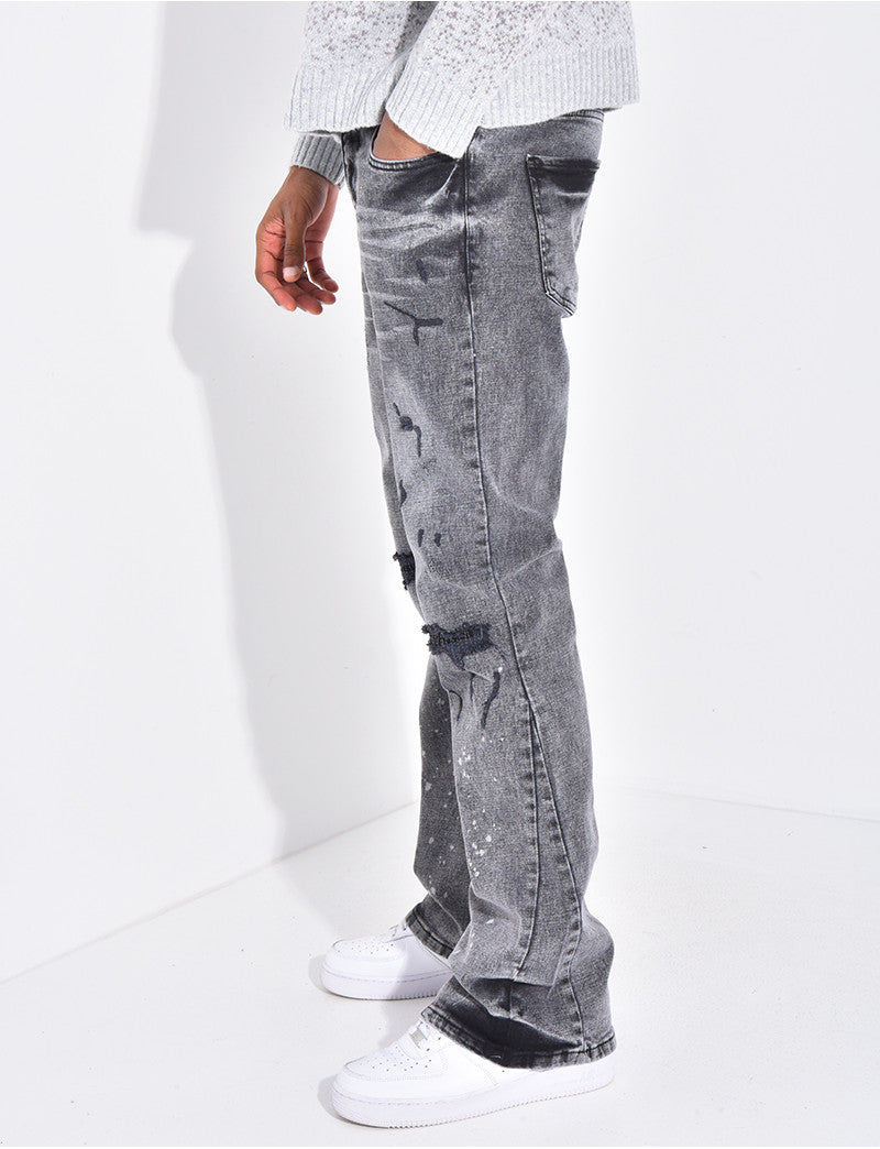 Jeans coupe droite destroy à tâches de peinture
