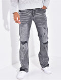 Jeans coupe droite destroy à tâches de peinture